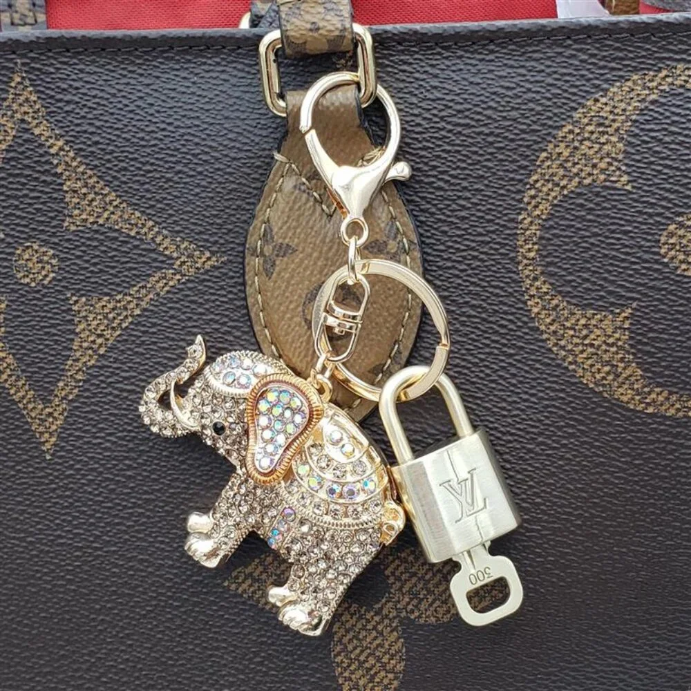 Authentic Louis Vuitton Lock & Key with Unbranded Elephant Charm, Keychain